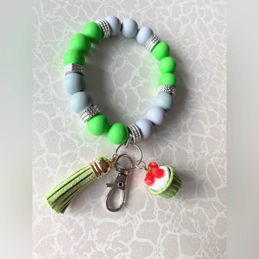 Green and Gray Beaded Bracelet with Charms
